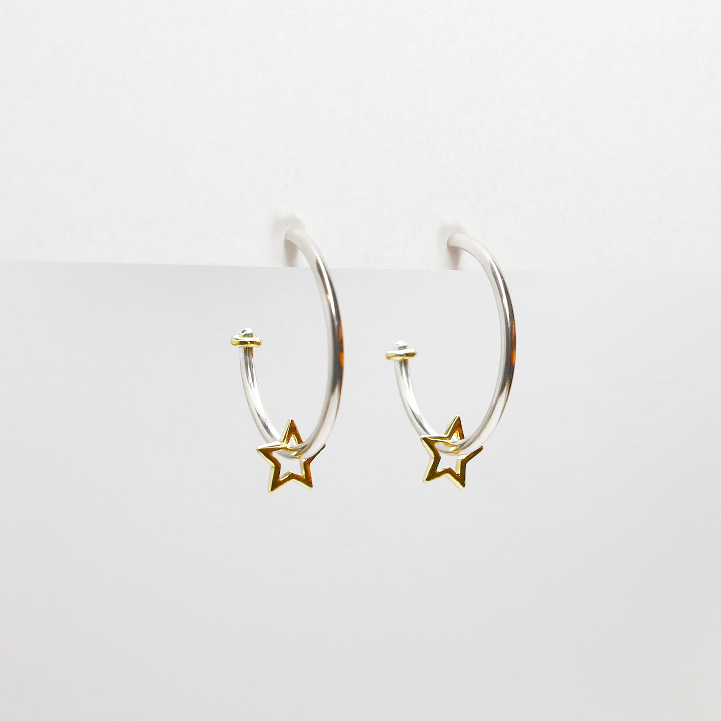 Argollas con Charm Estrella AG + OA