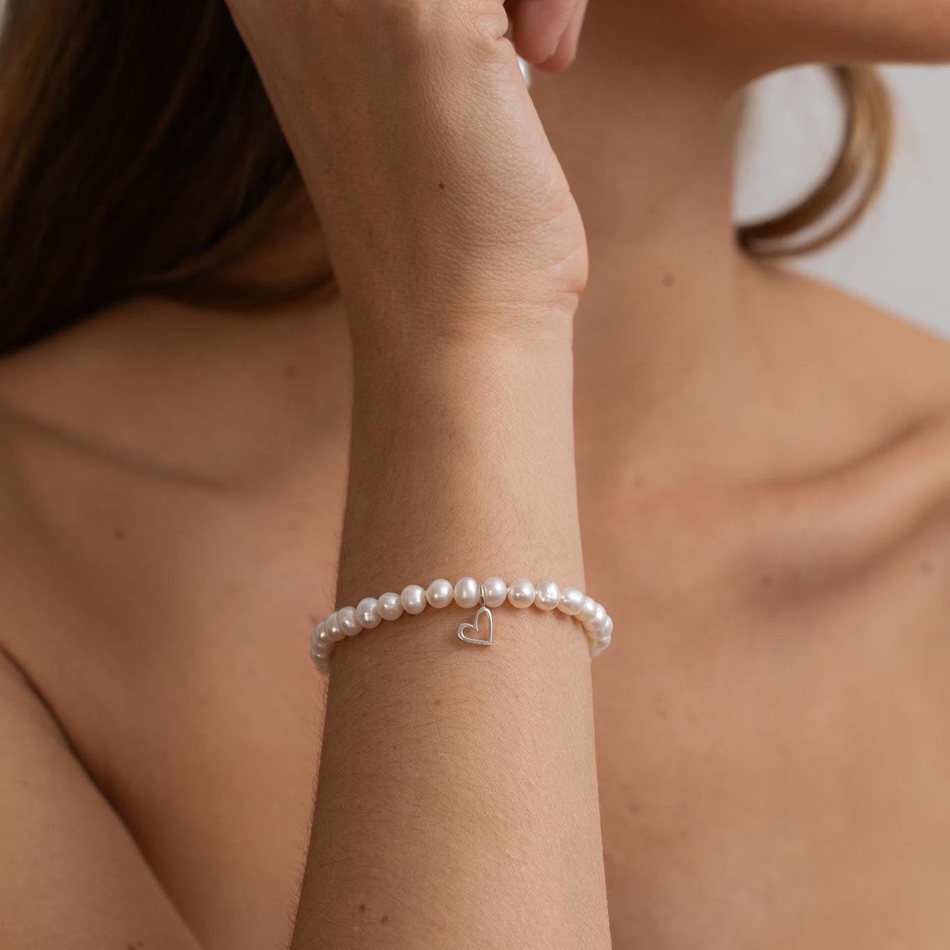 Pulsera Perlas + corazón plata HB
