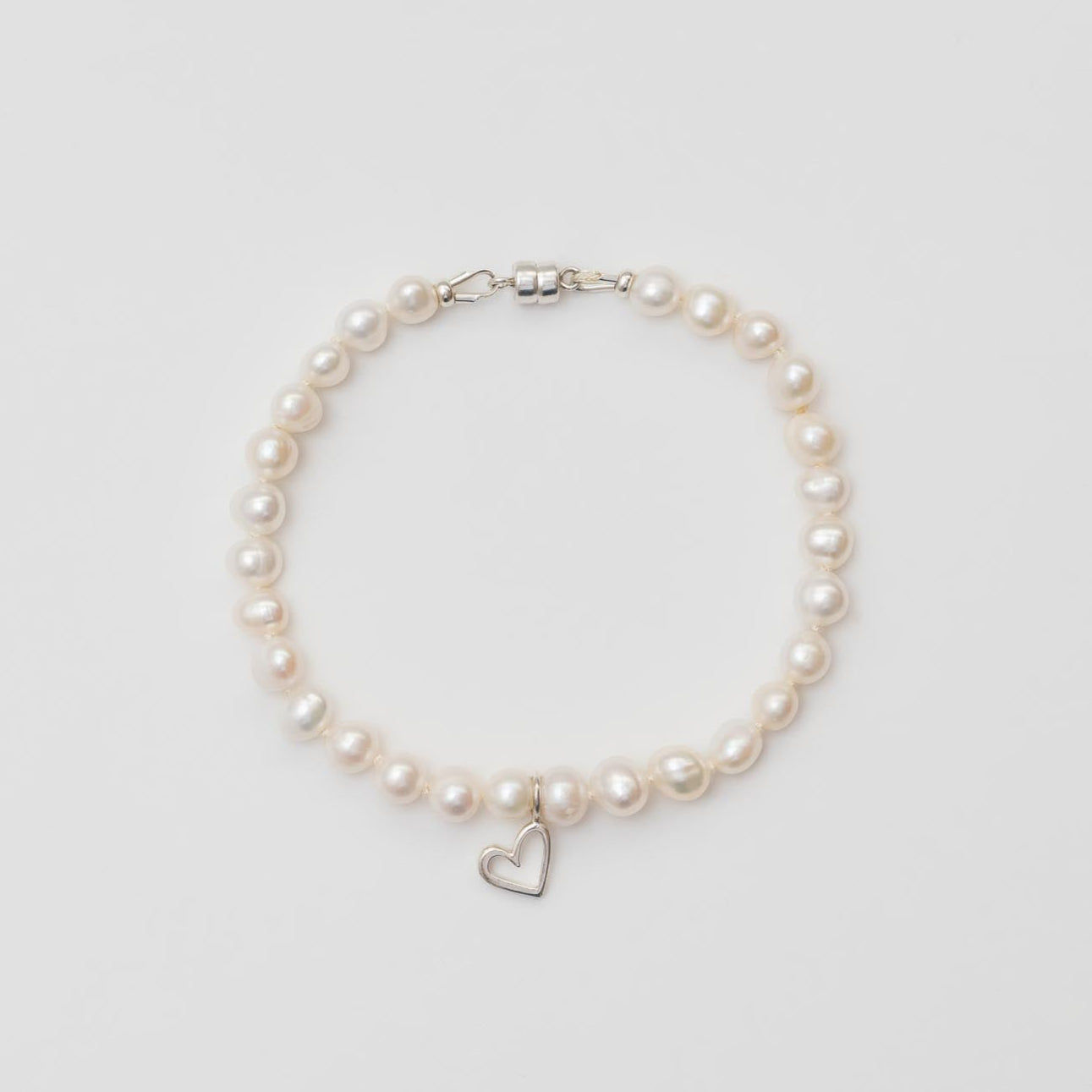 Pulsera Perlas + corazón plata HB