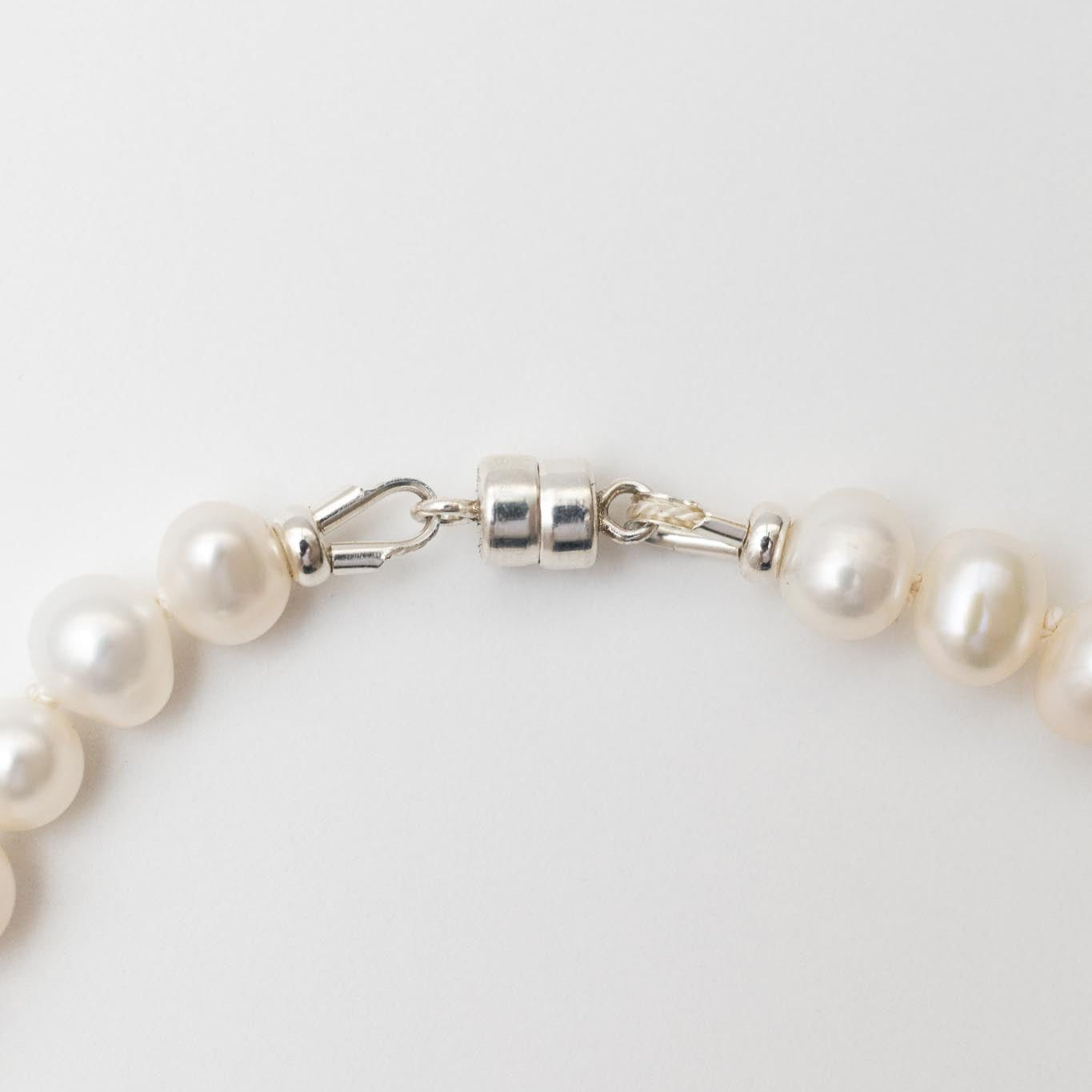 Pulsera Perlas + corazón plata HB
