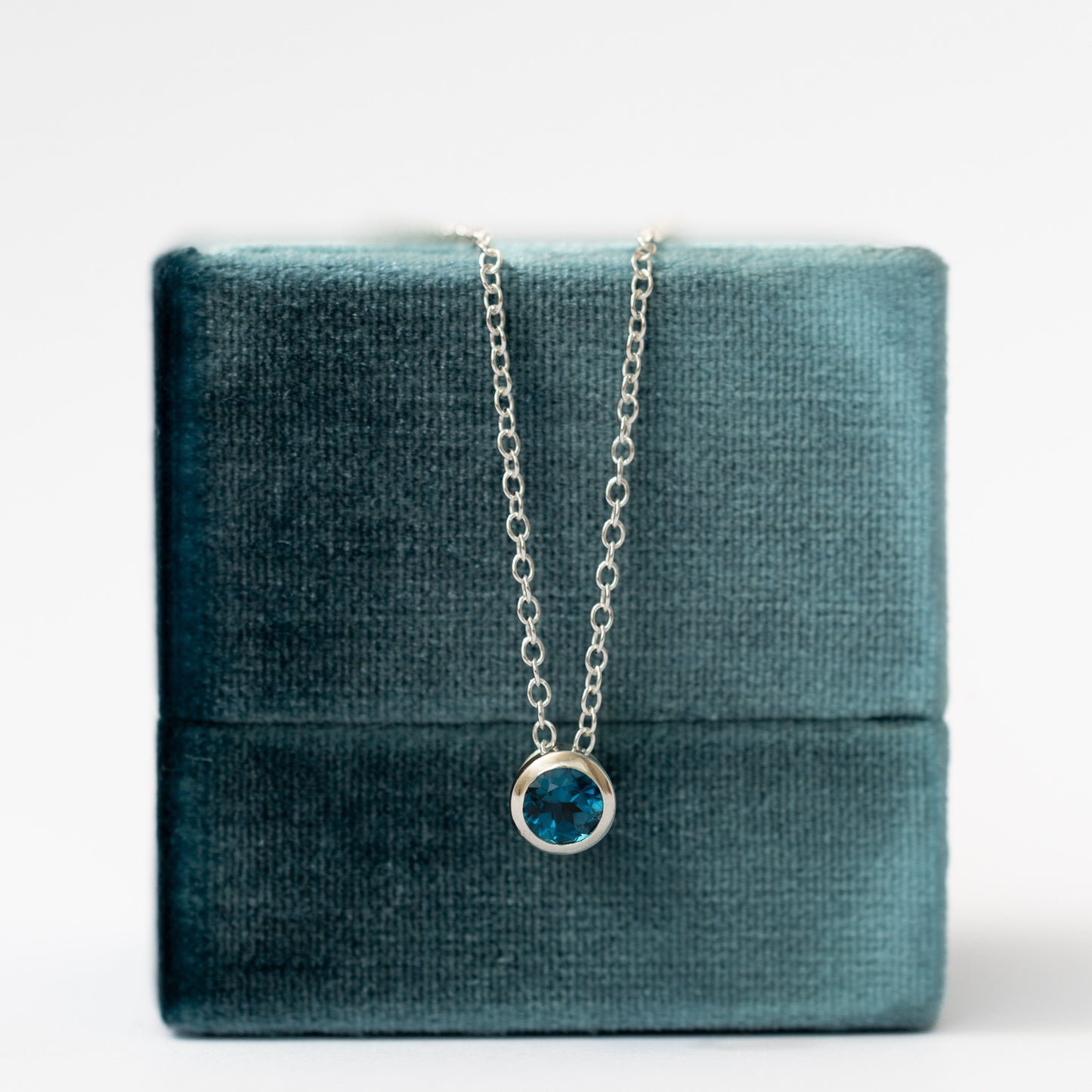 Punto de Luz Topacio London Blue plata