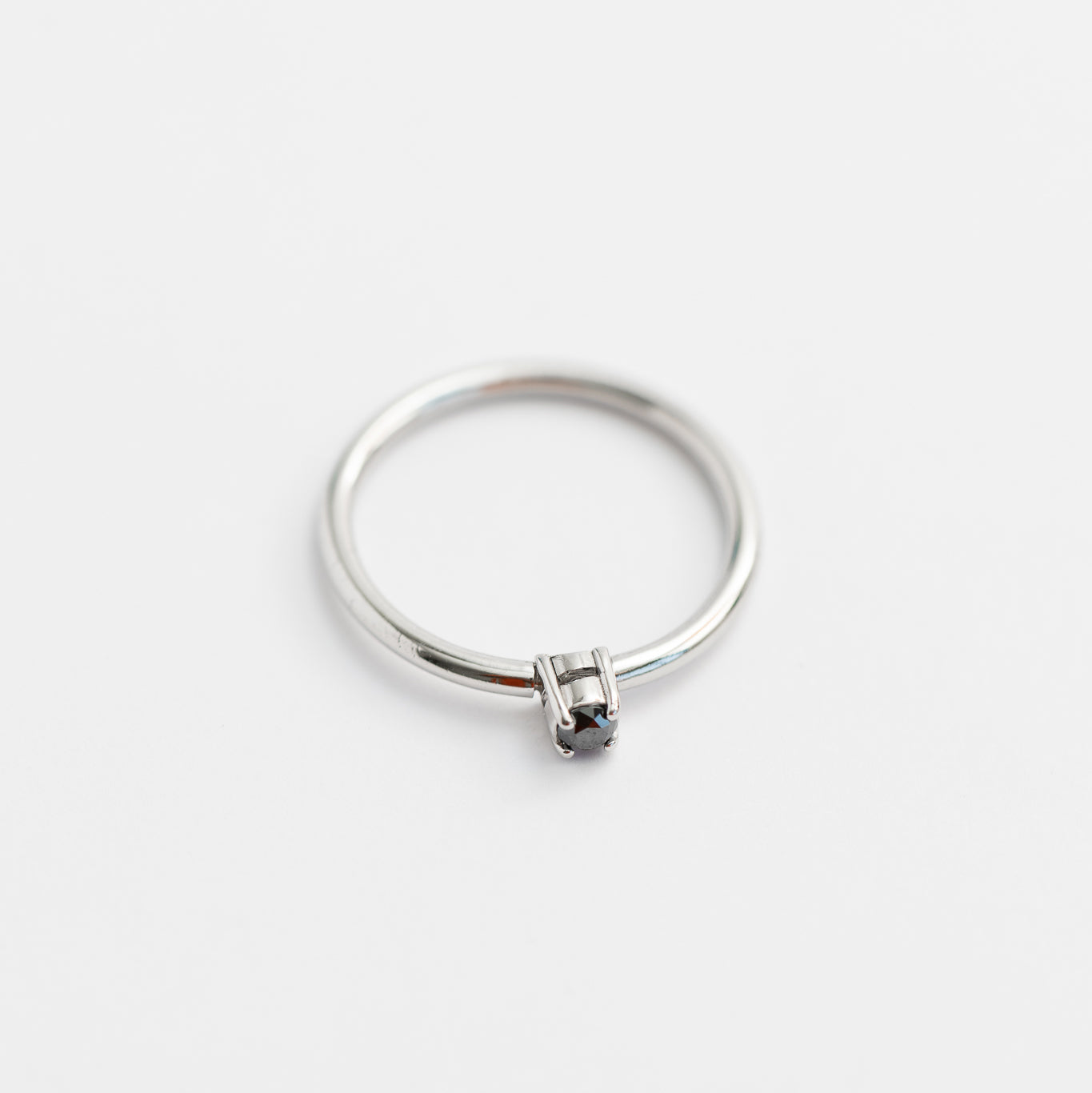 Anillo Mini Solitario 0.08ct N PT