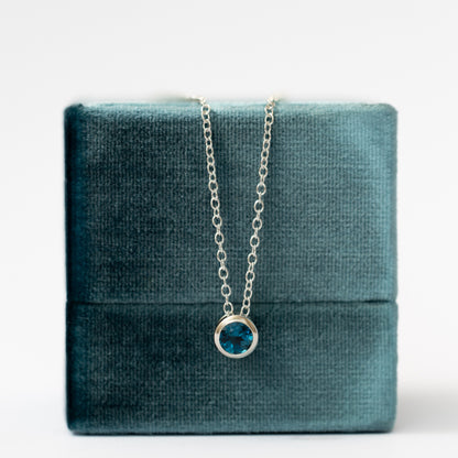 Punto de Luz Topacio London Blue plata