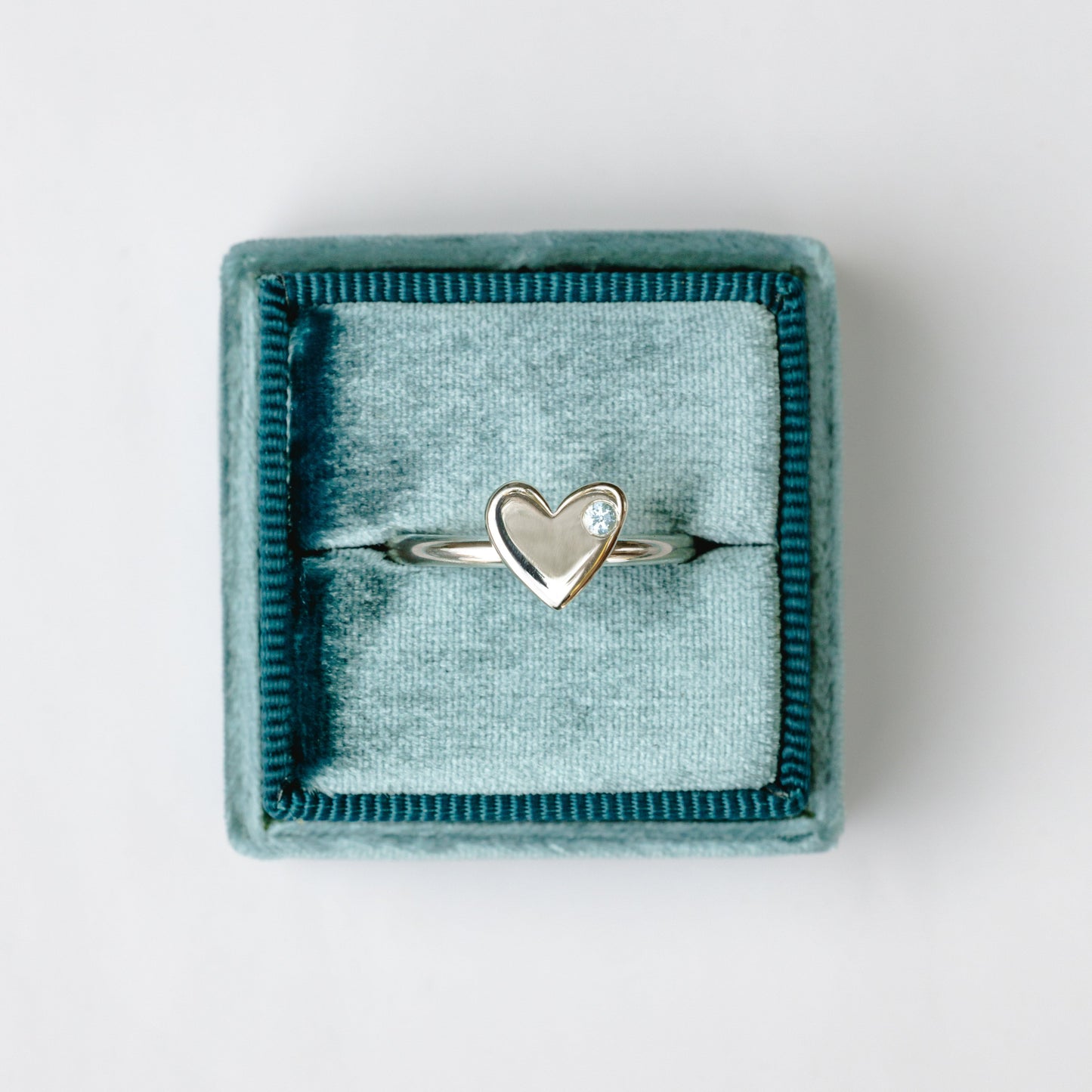 Anillo Corazón plata + topacio azul