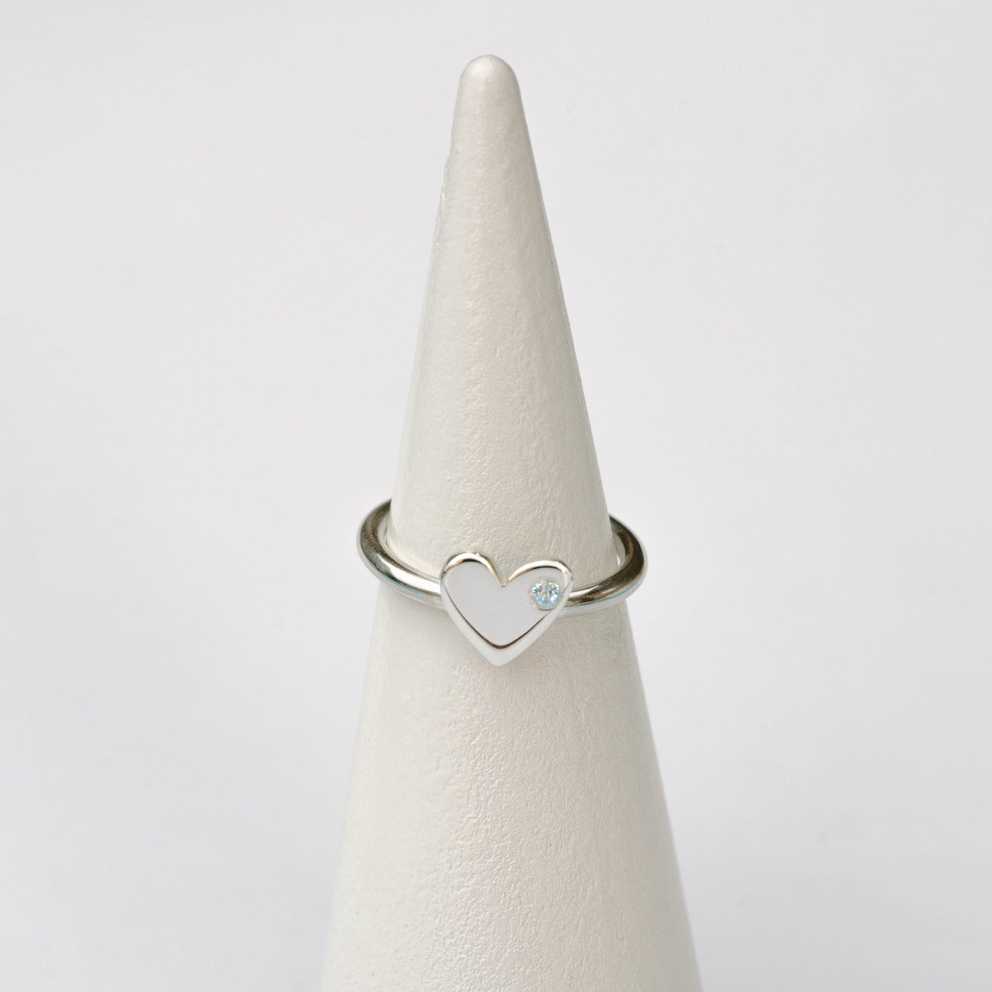 Anillo Corazón plata + topacio azul